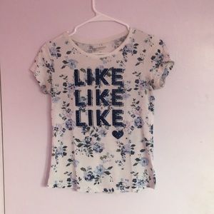 An Arizona Jean Co. glittery blue floral shirt